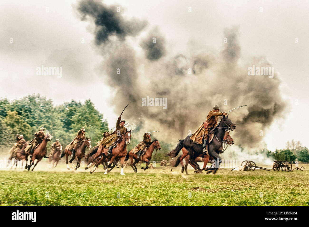 Polish cavalry ride their horses during WWII Battle of Lomianki - historical reenactment, Poland Stock Photo