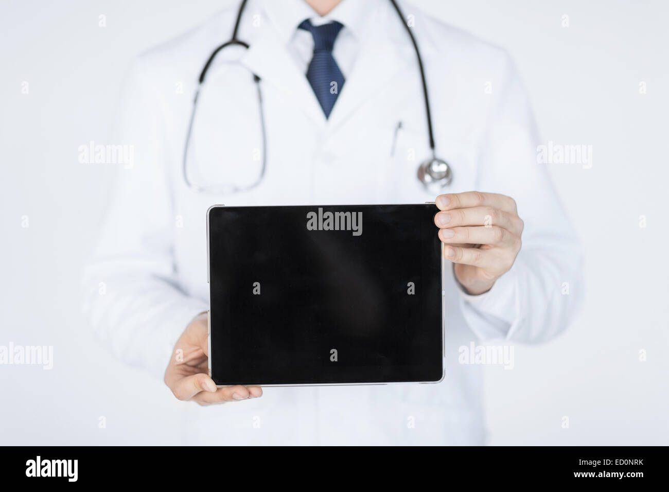 male doctor holding tablet pc Stock Photo - Alamy
