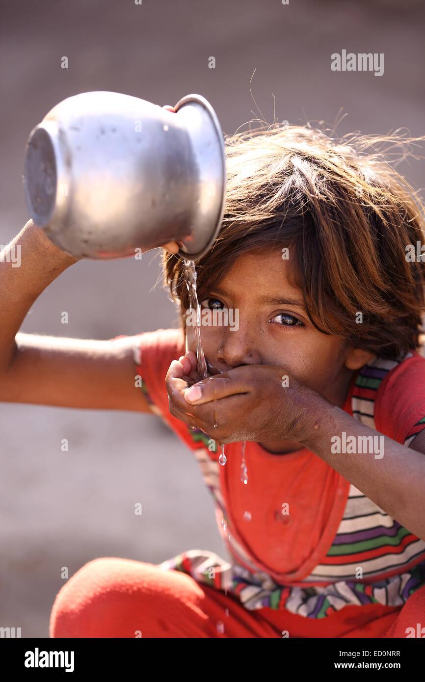 Indian gboy drinking water India Stock Photo