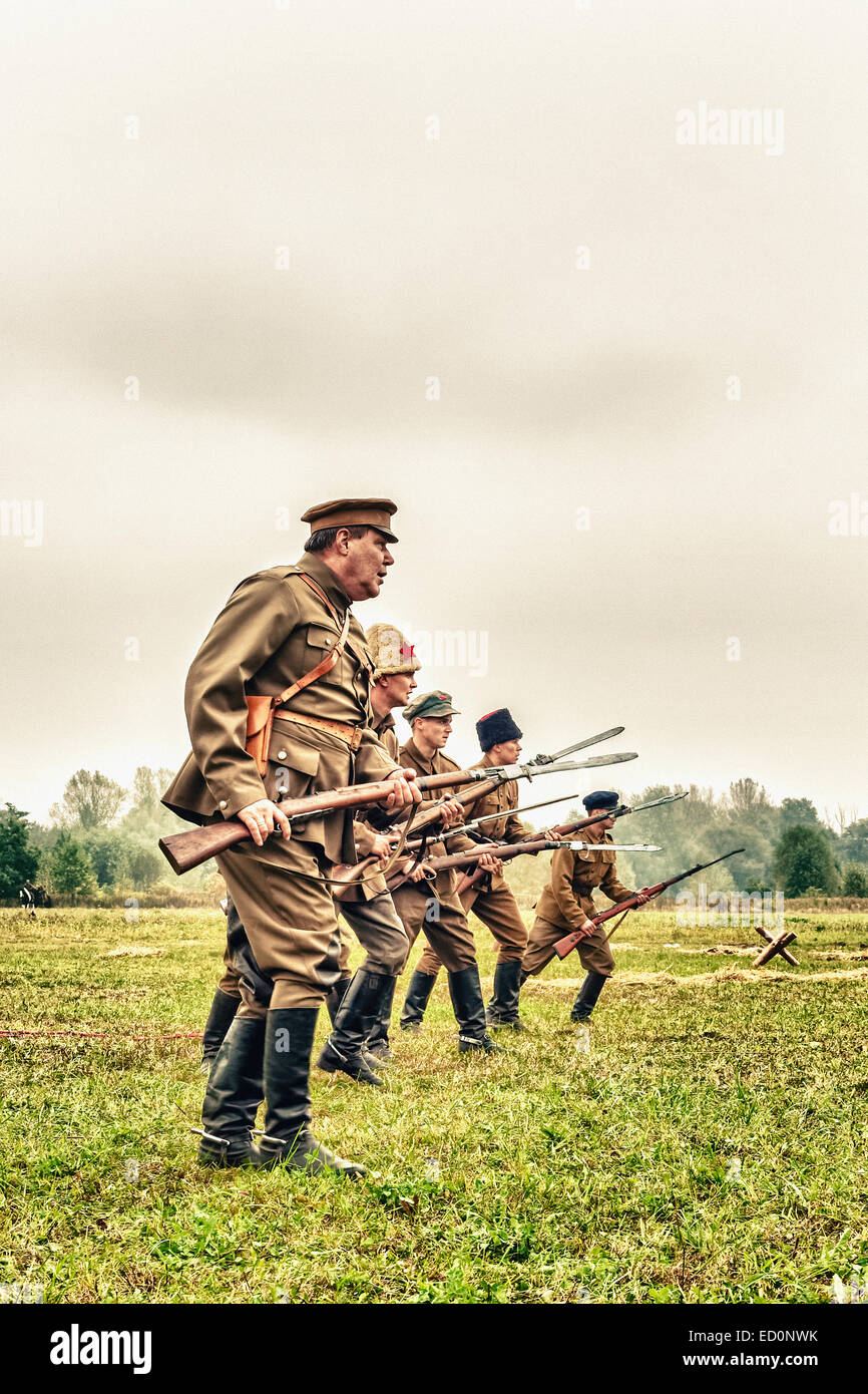 Soviet infantry show bayonets fight during WWII historical reenactment in Lomianki, Poland Stock Photo
