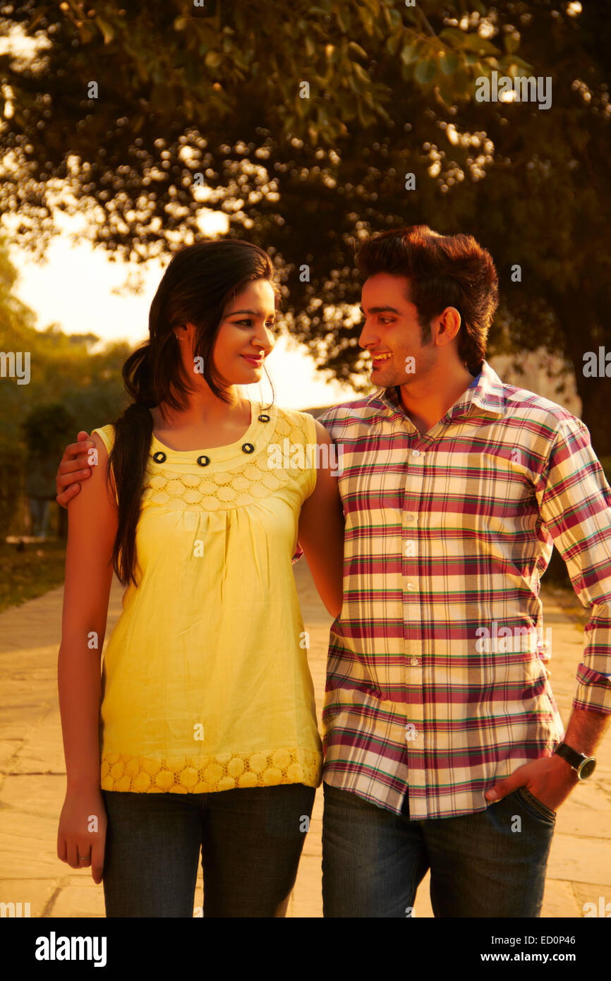 2 indian couple park walking Stock Photo - Alamy