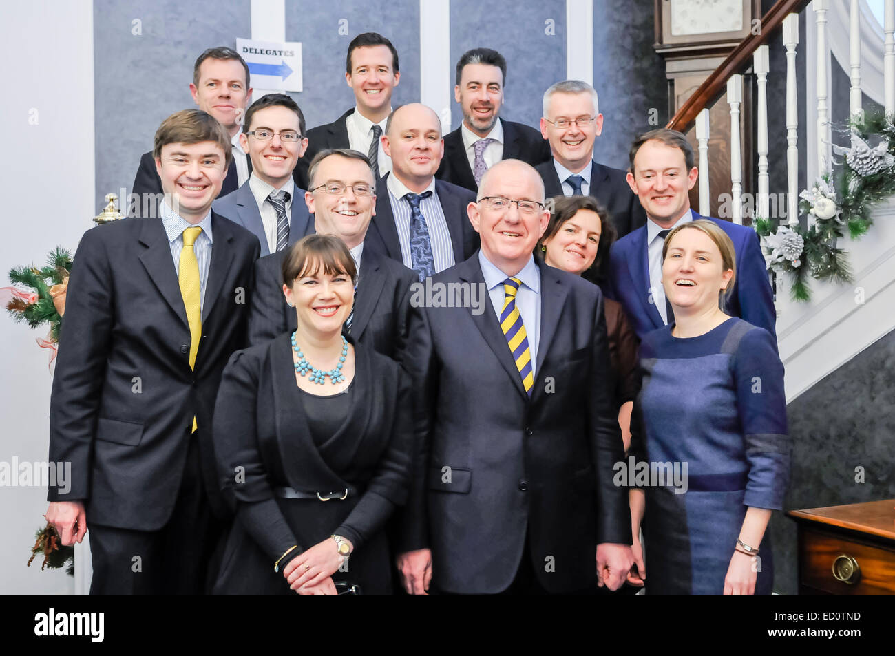 Belfast, Northern Ireland. 23 Dec 2014 - The Irish Government contingent, led by Minister For Foreign Affairs Charles Flanaghan, who helped broker an agreement between the Northern Ireland executive parties, and the British and Irish Governments Credit:  Stephen Barnes/Alamy Live News Stock Photo