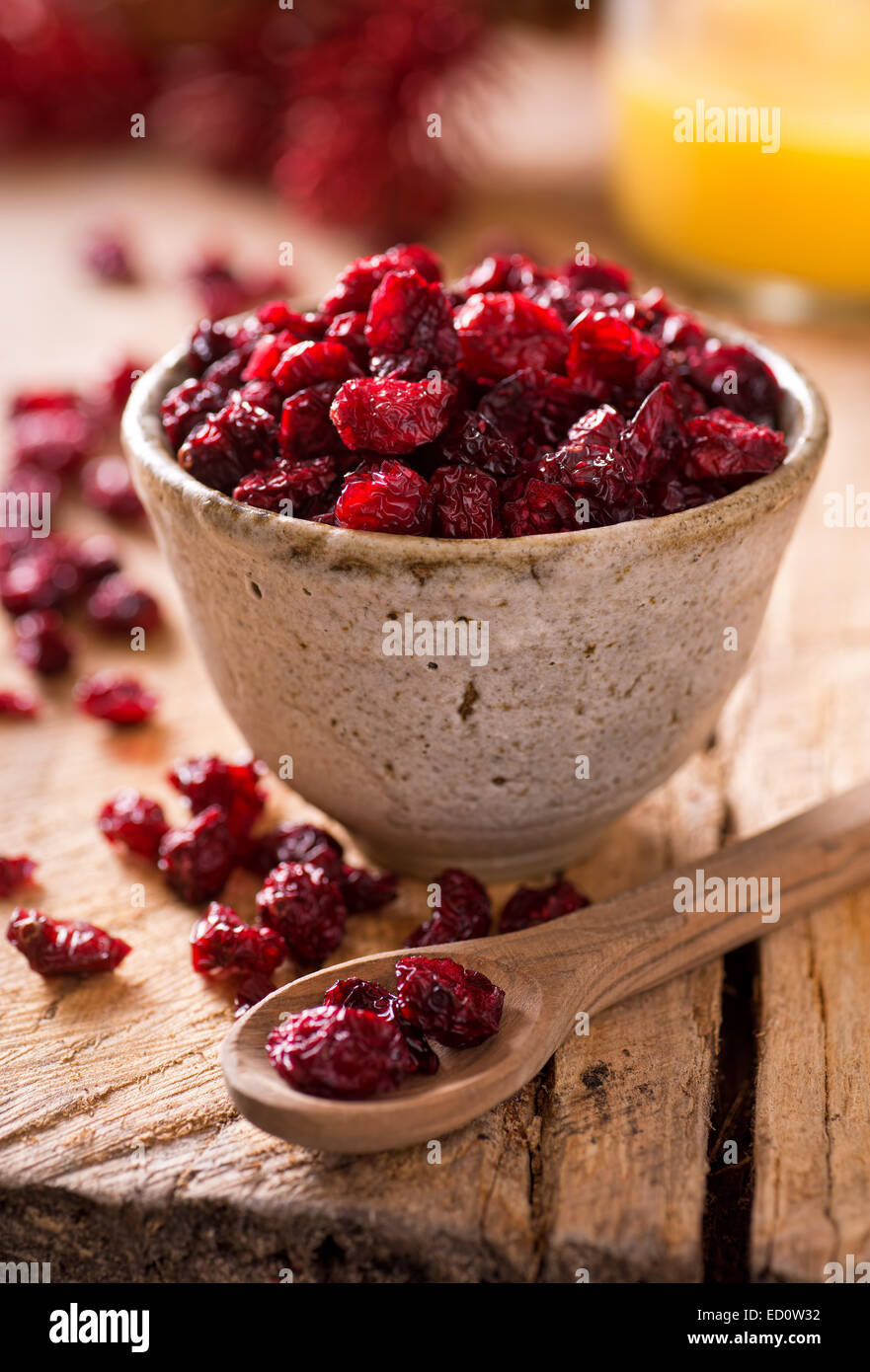 A bowl of delicious tart and sweet dried cranberries. Stock Photo