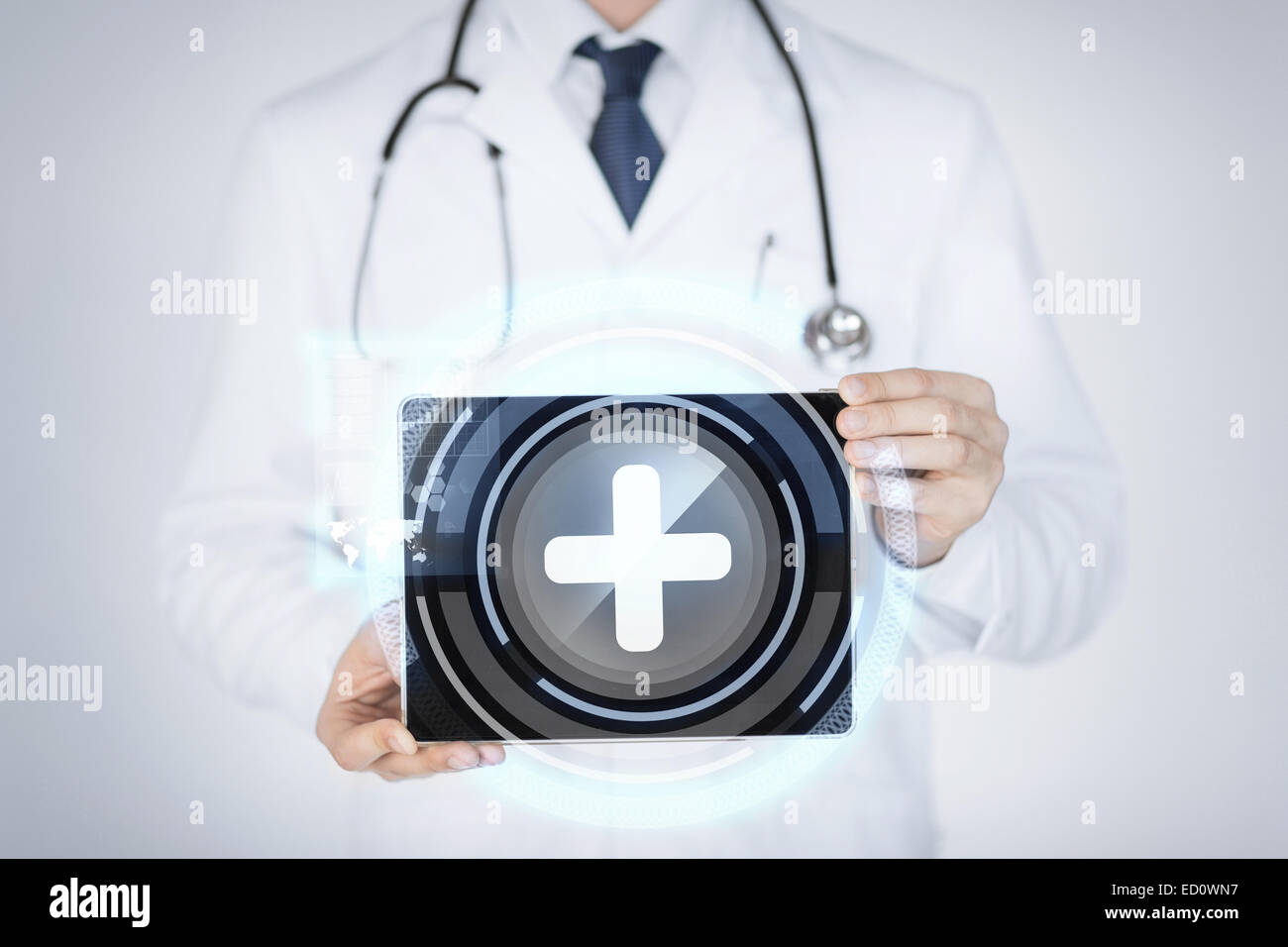 male doctor holding tablet pc with medical app Stock Photo - Alamy