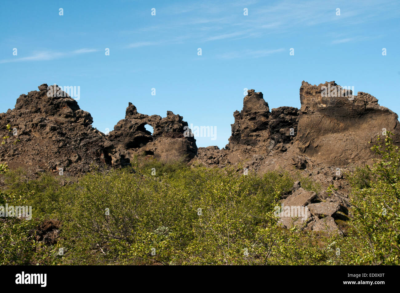 Dimmuborgir is a some 2300 years old lava flow where an eruption of the huge Krafla volcano forms fantastic rock structures. Stock Photo