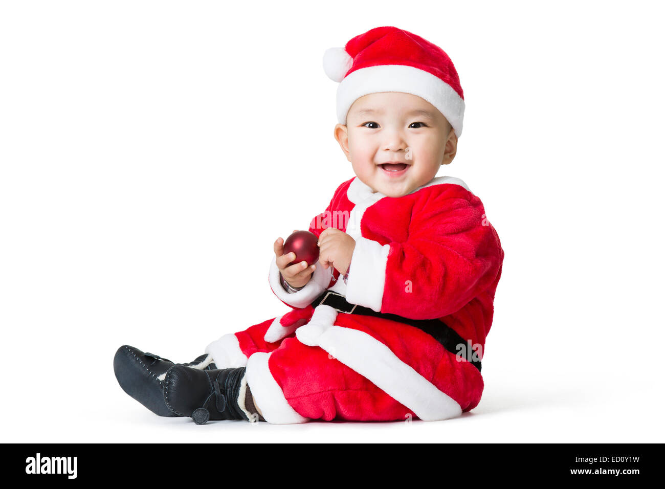 Cute baby in Santa suit Stock Photo - Alamy