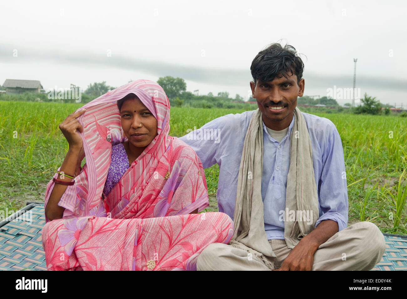 2 indian rural  Married Couple sitting farm Stock Photo