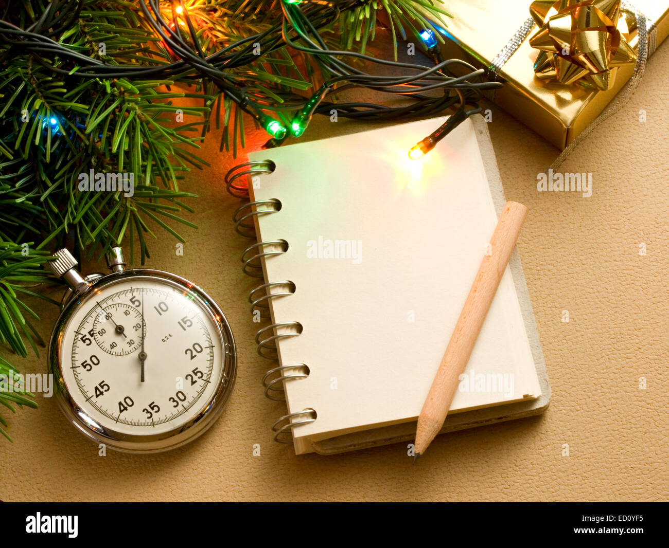 Christmas tree, stopwatch, gift and notepad Stock Photo Alamy