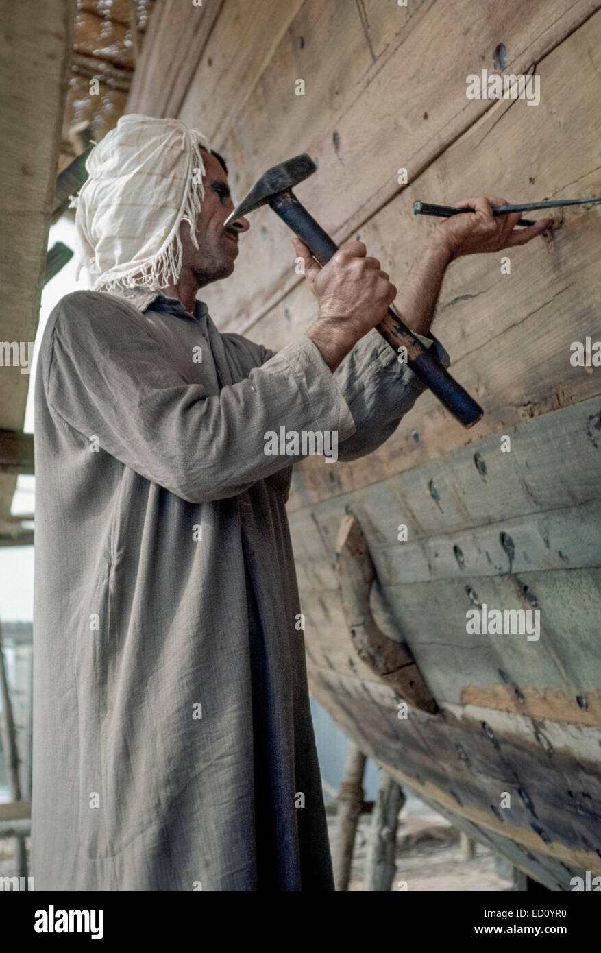 Kuwait April 1967. Carpenter Hammering Nails into Hull of Dhow Stock Photo Alamy