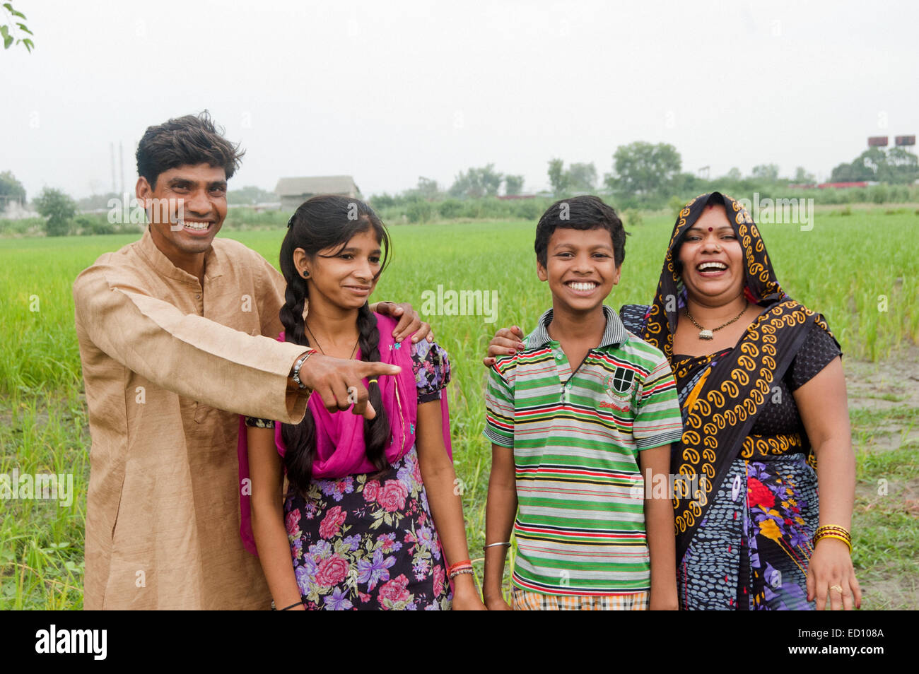 indian rural  Parents and children showing farm Stock Photo