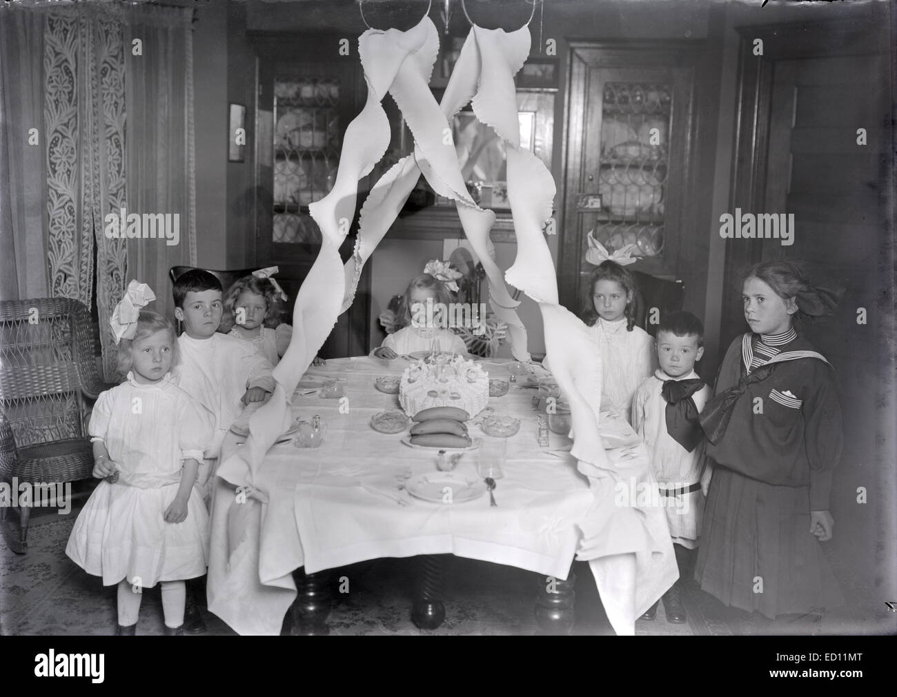Antique, circa 1911 image, Victorian birthday party for a 6- or 7-year-old girl in Jamaica Plain, Boston, Massachusetts, USA. Stock Photo