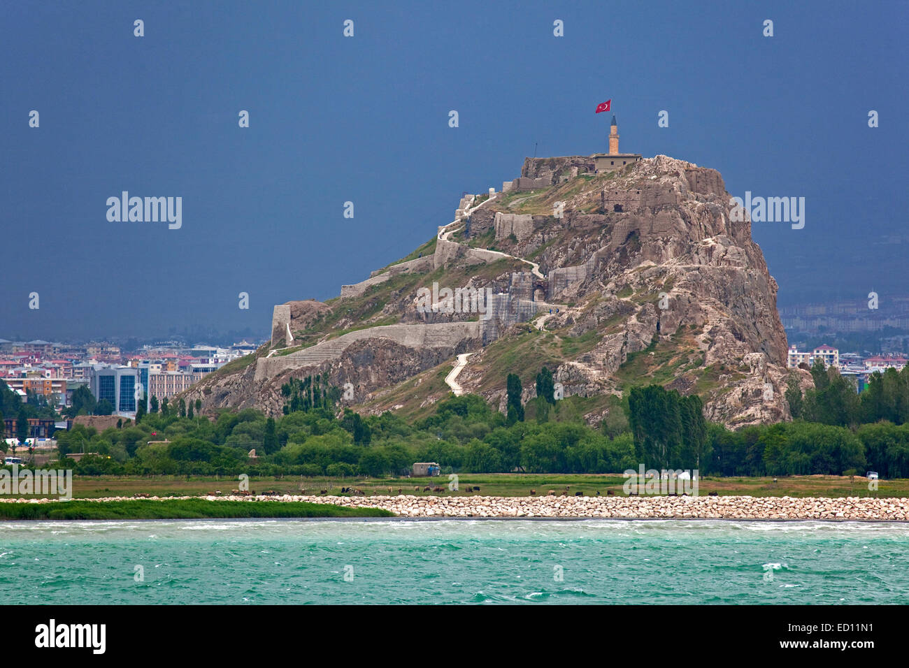 The Fortress of Van / Van Citadel / Van Kalesi on the shores of Lake Van during thunderstorm, Turkey Stock Photo