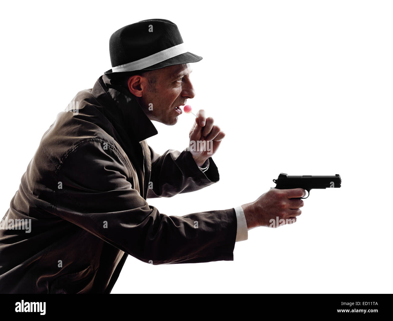 one detective man criminal investigations investigating crime in silhouette on white background Stock Photo
