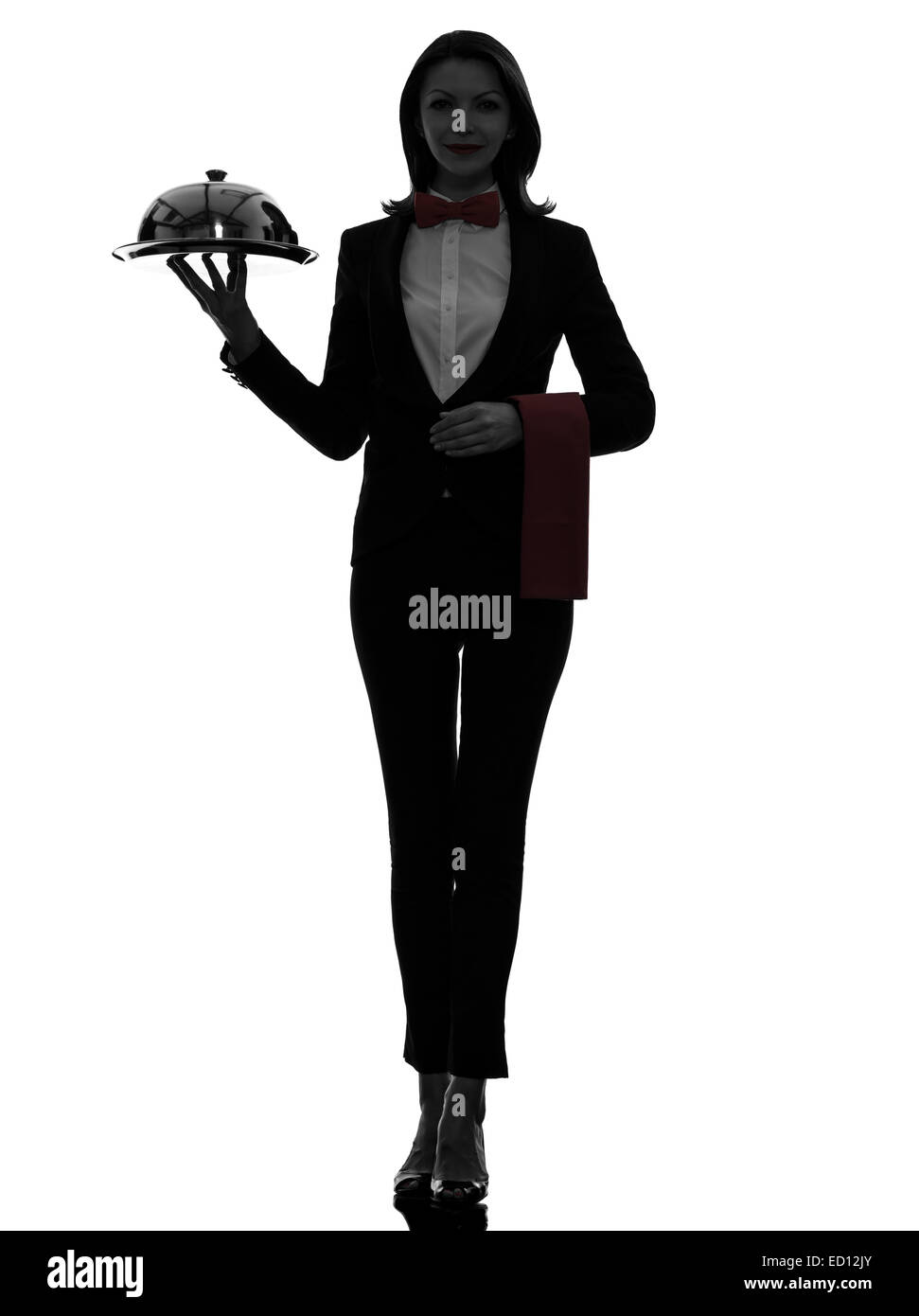 one  woman waiter butler serving dinner with catering dome in silhouette on white background Stock Photo