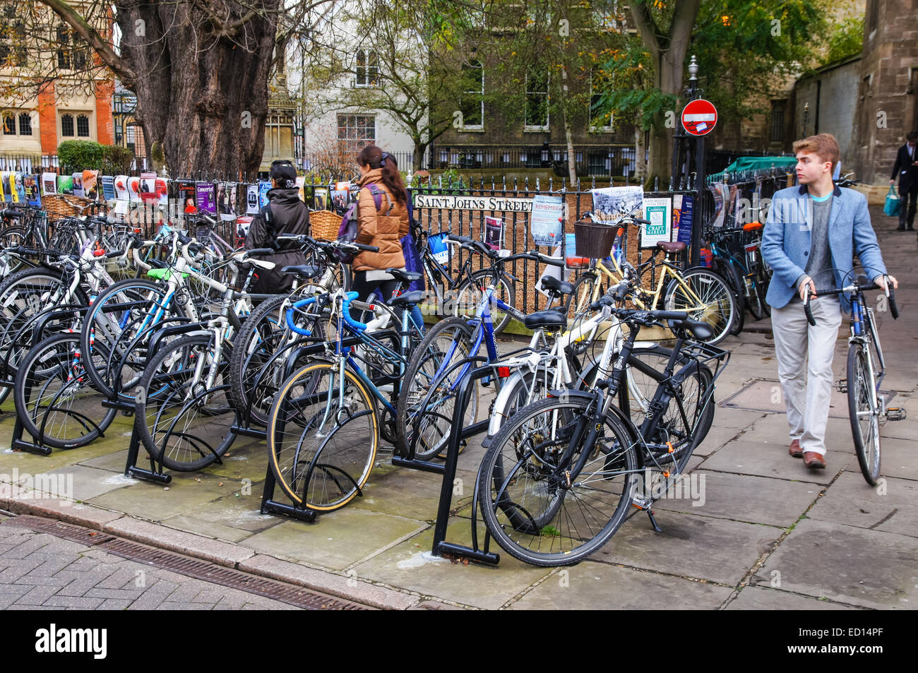 Bicycles parked at a bike rack in Cambridge Cambridgeshire England United Kingdom UK Stock Photo