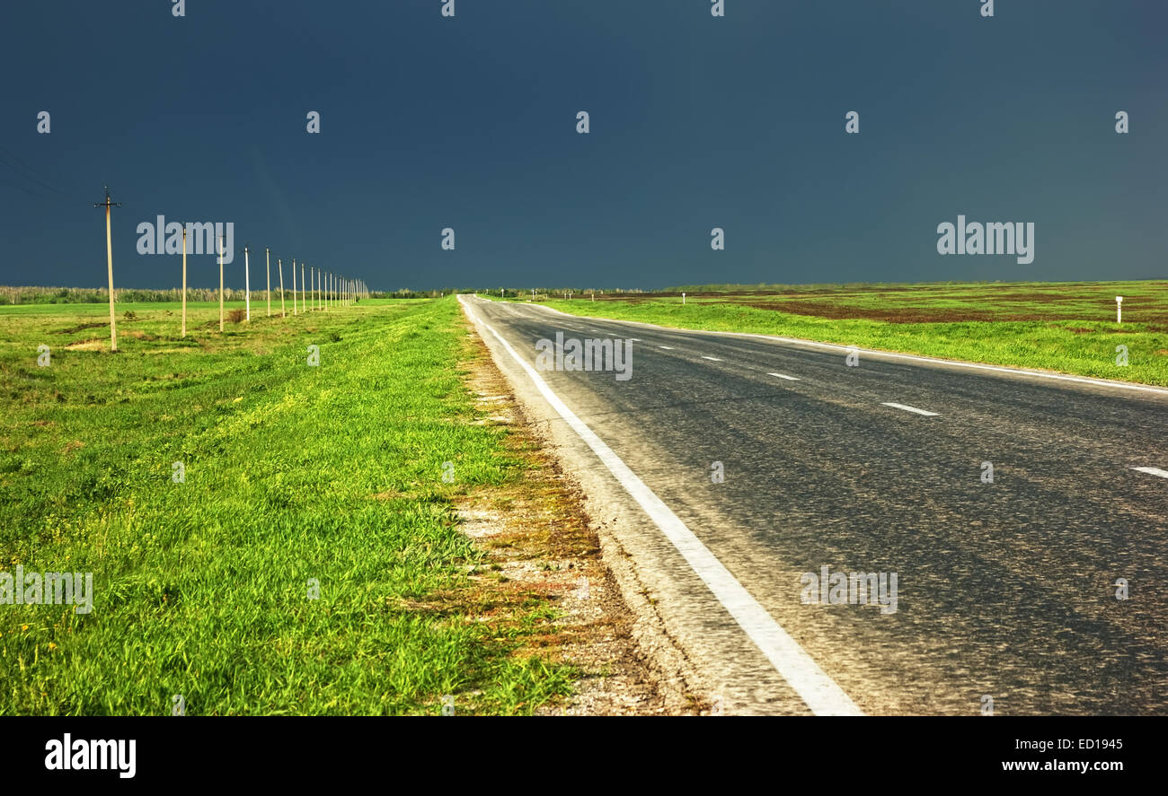 Rural country two lane highway  before the storm Stock Photo