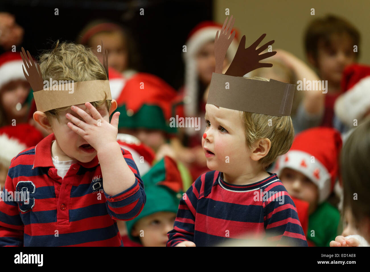 Pre-school children singing at the daycare Christmas show Stock Photo