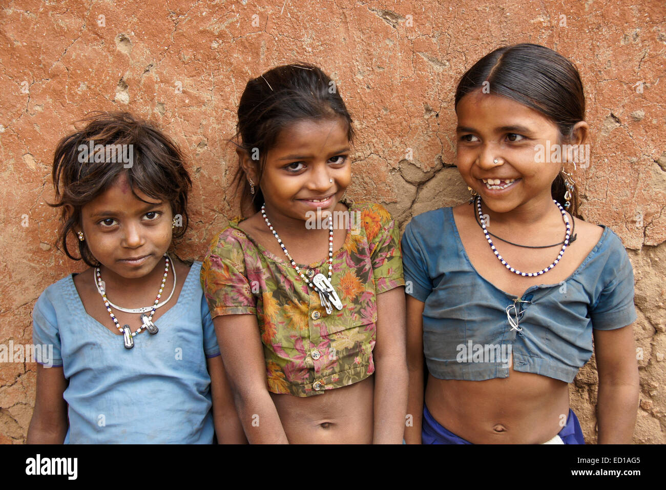 Three young girls of Adivasi tribe near Poshina, Gujarat, India Stock Photo