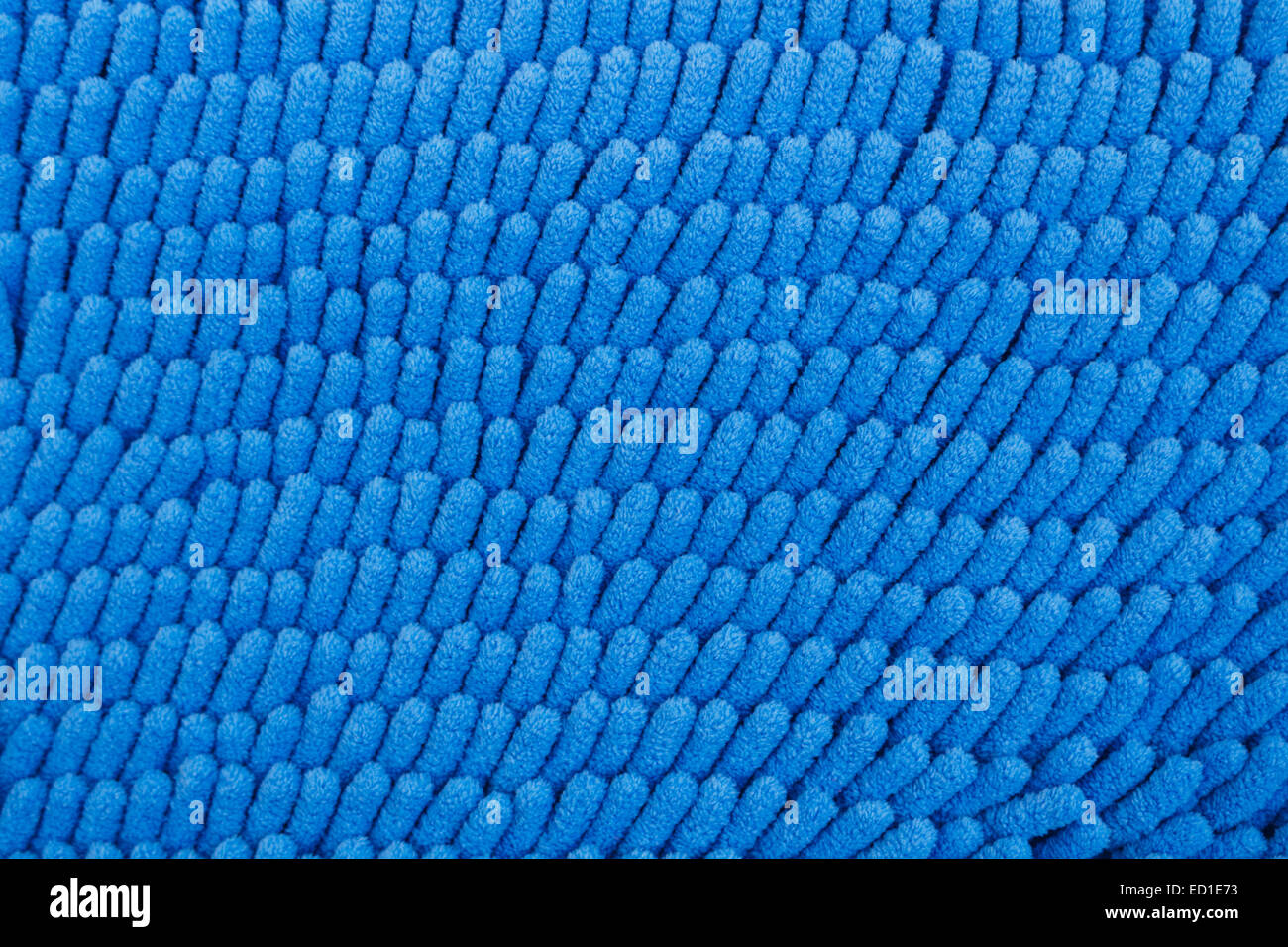 Beautiful carpets made from synthetic blue backdrop. Stock Photo