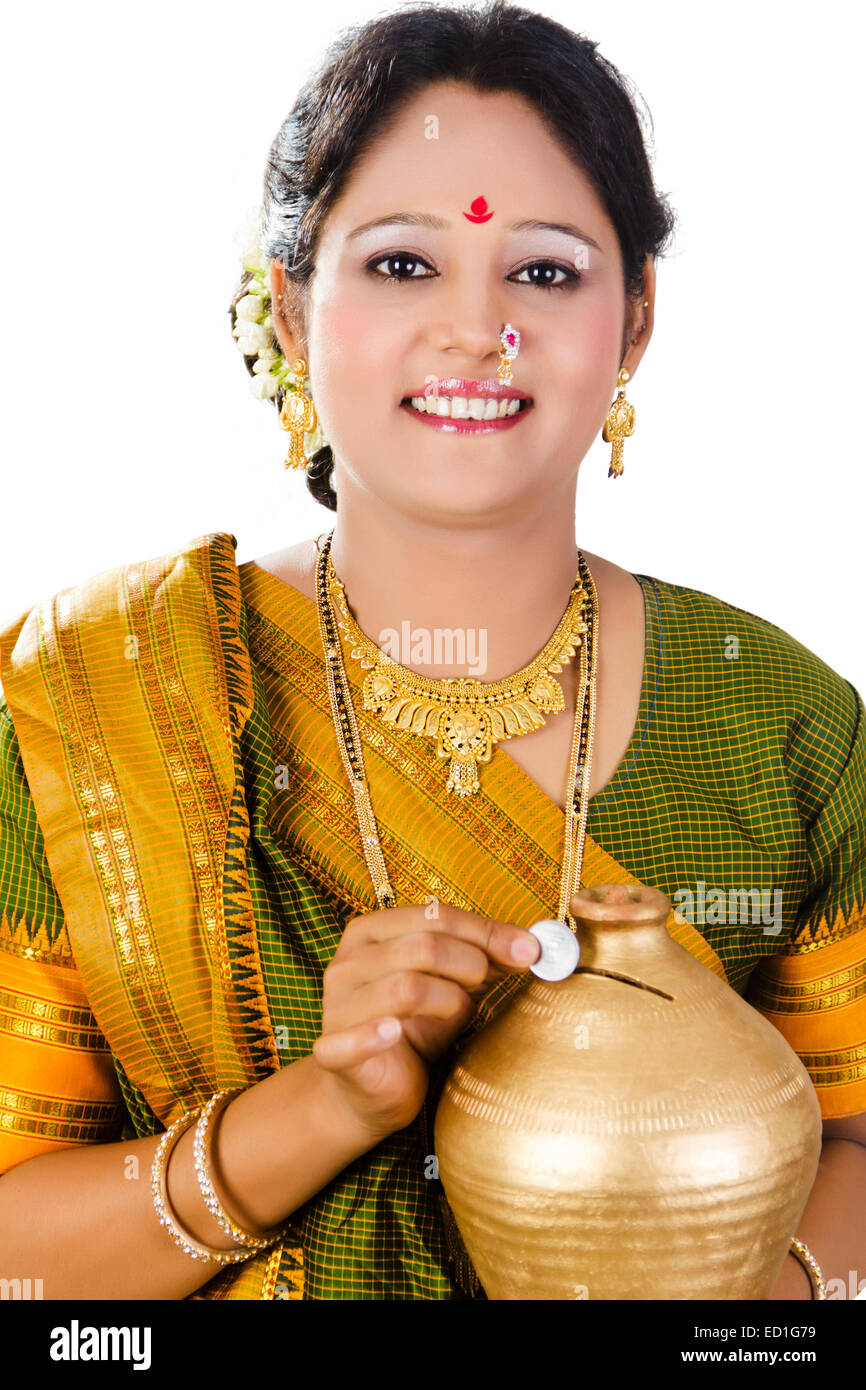 1 South  indian Lady saving money Piggy Bank Stock Photo