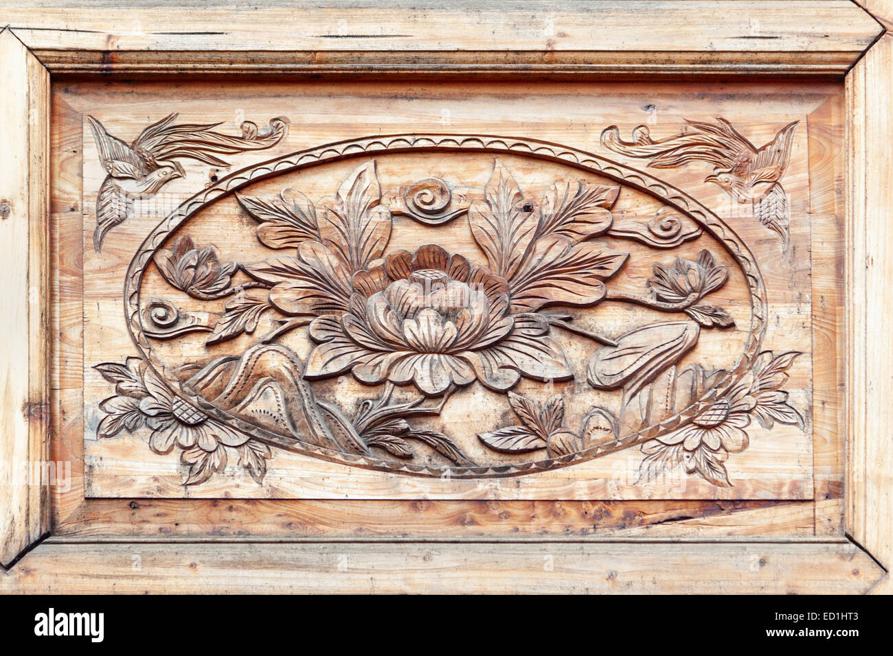 Pattern of flower carved on wood.Part of decoration on the Chinese wooden window. Stock Photo