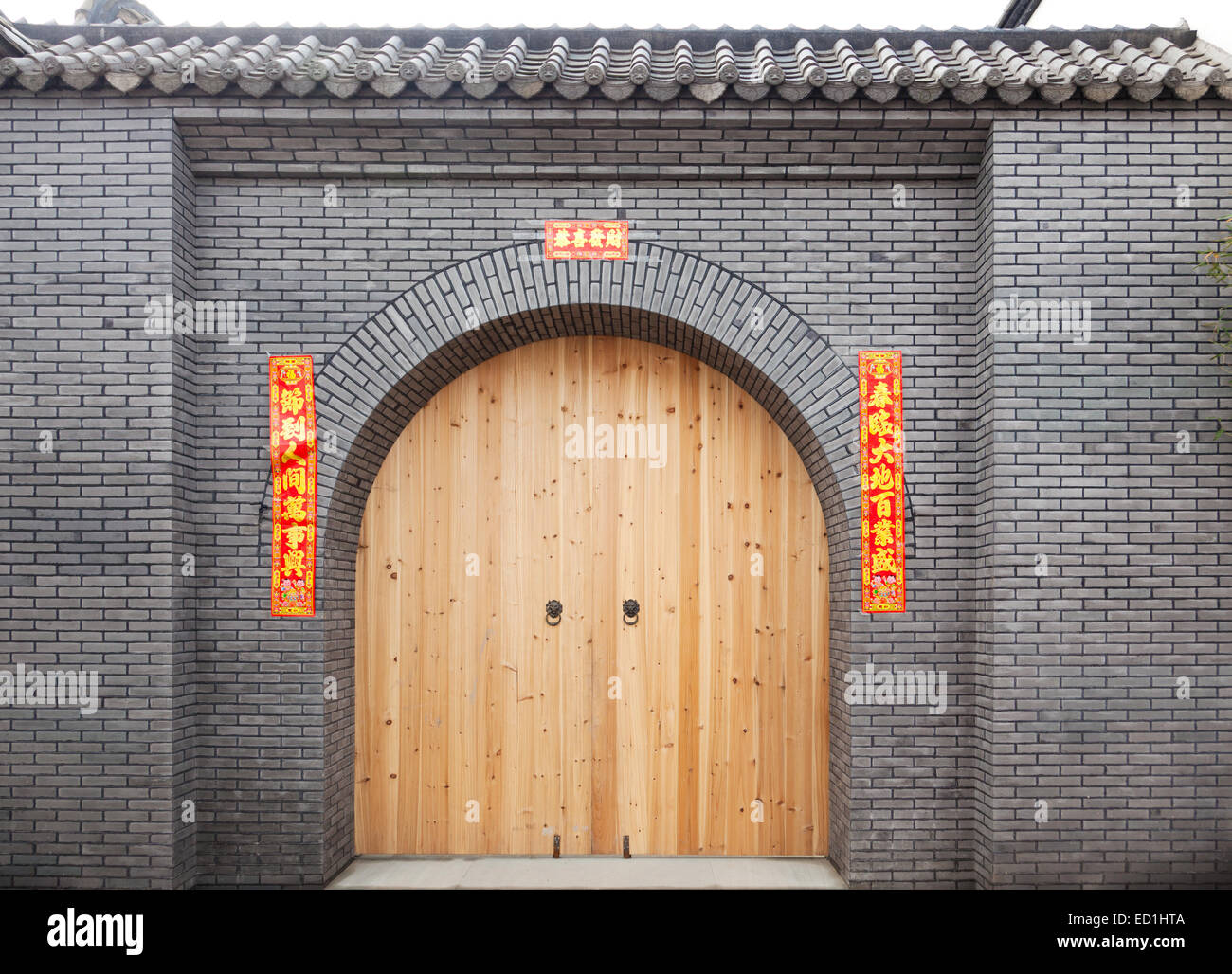 Chinese Traditional Door With An Red Antithetical Spring Couplet For New Year