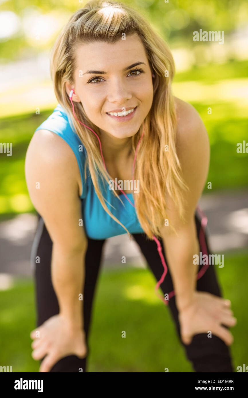 Fit blonde catching her breath Stock Photo - Alamy