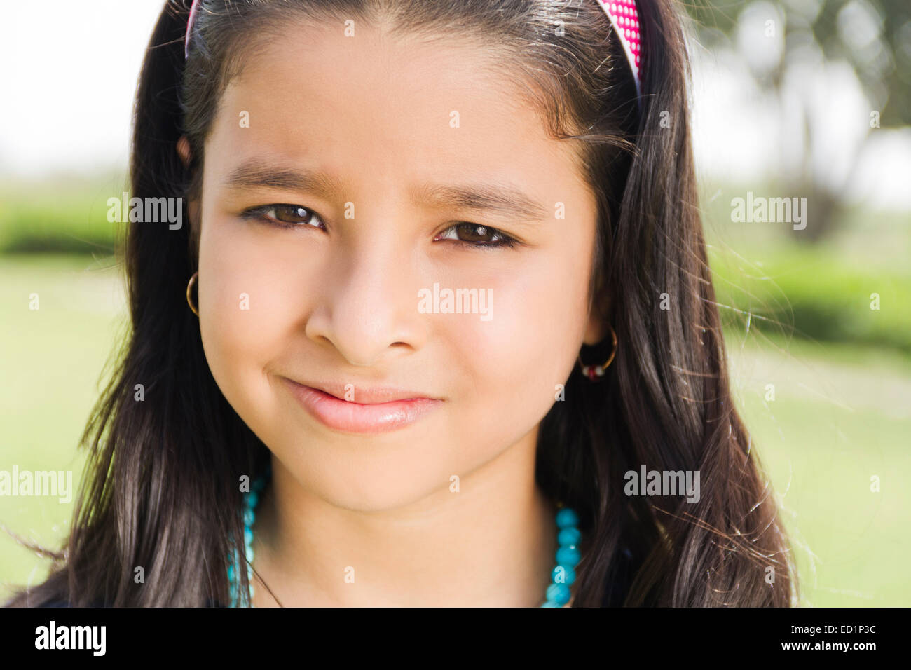1 indians Beautiful Child girl park enjoy Stock Photo