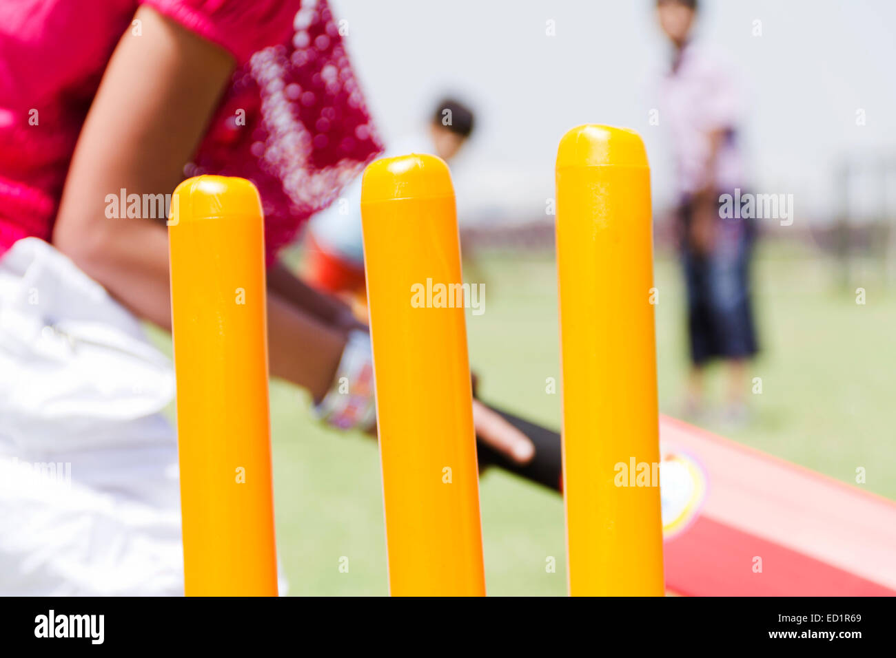 indians children park playing Cricket Stock Photo