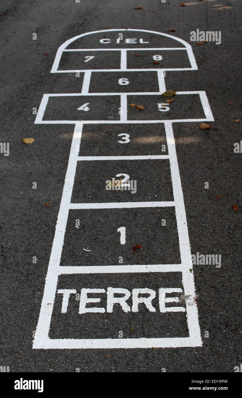 Hopscotch With French Words Terre Meaning Ground And Ciel For Sky On The Schoolyard Stock Photo