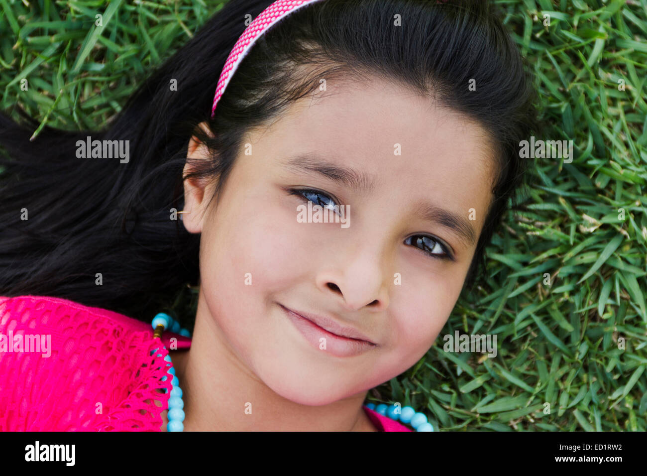 Preteen girl lying on back hi-res stock photography and images - Alamy