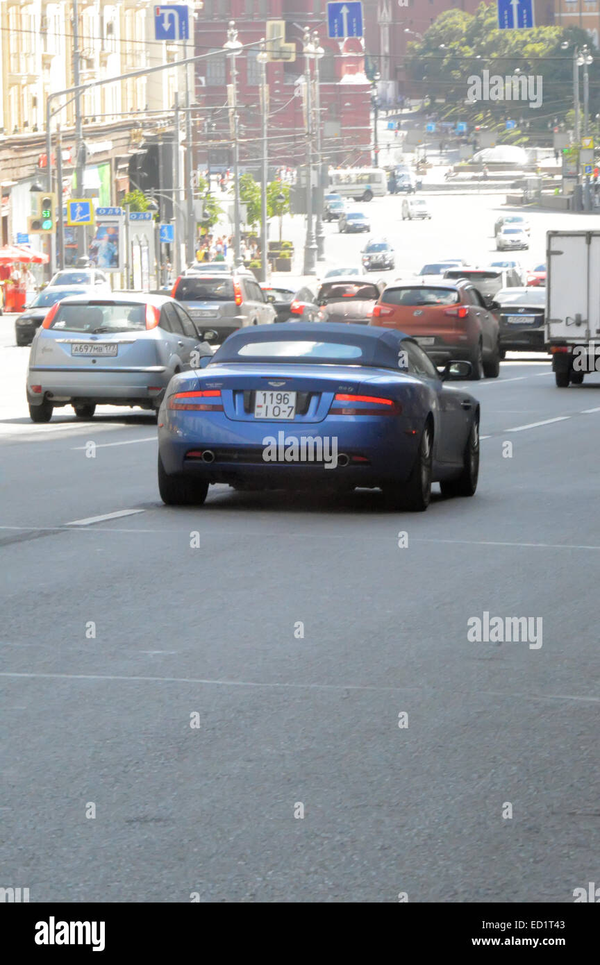 Aston Martin dark blue walking along Tverskaya Street. Moscow. July Stock Photo