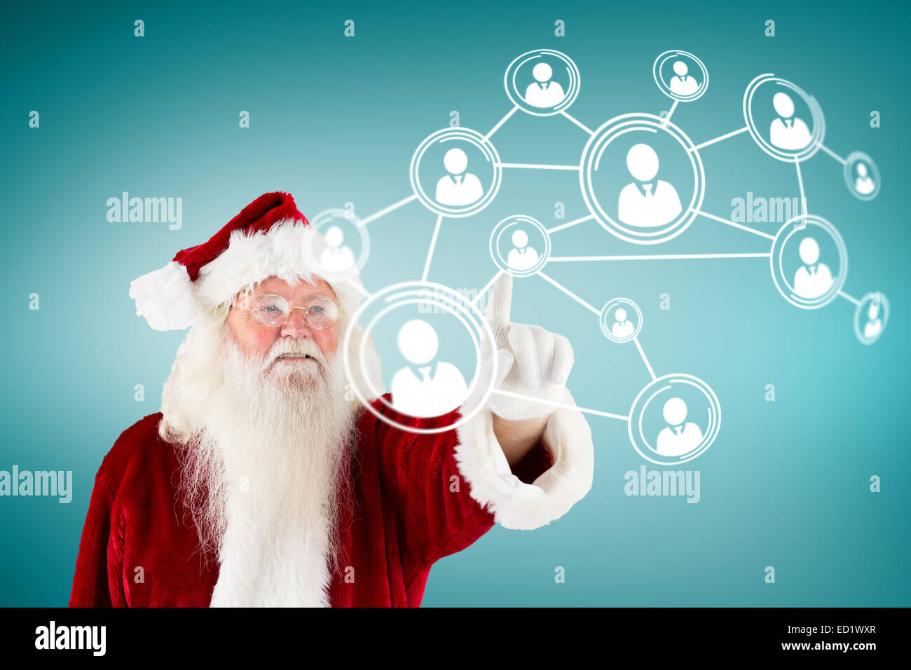 Composite image of santa claus pointing Stock Photo - Alamy