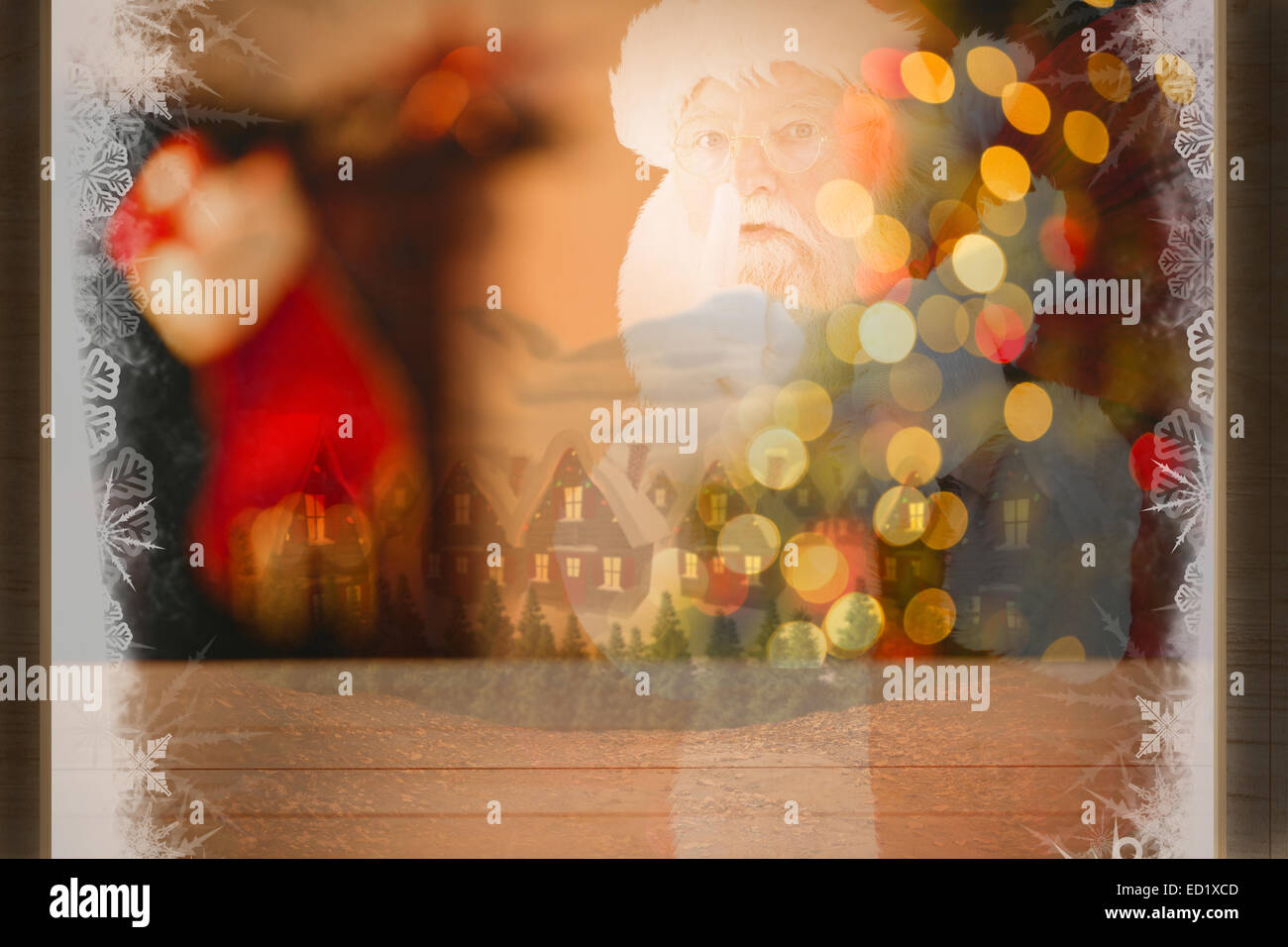 Composite image of santa claus carrying sack Stock Photo - Alamy