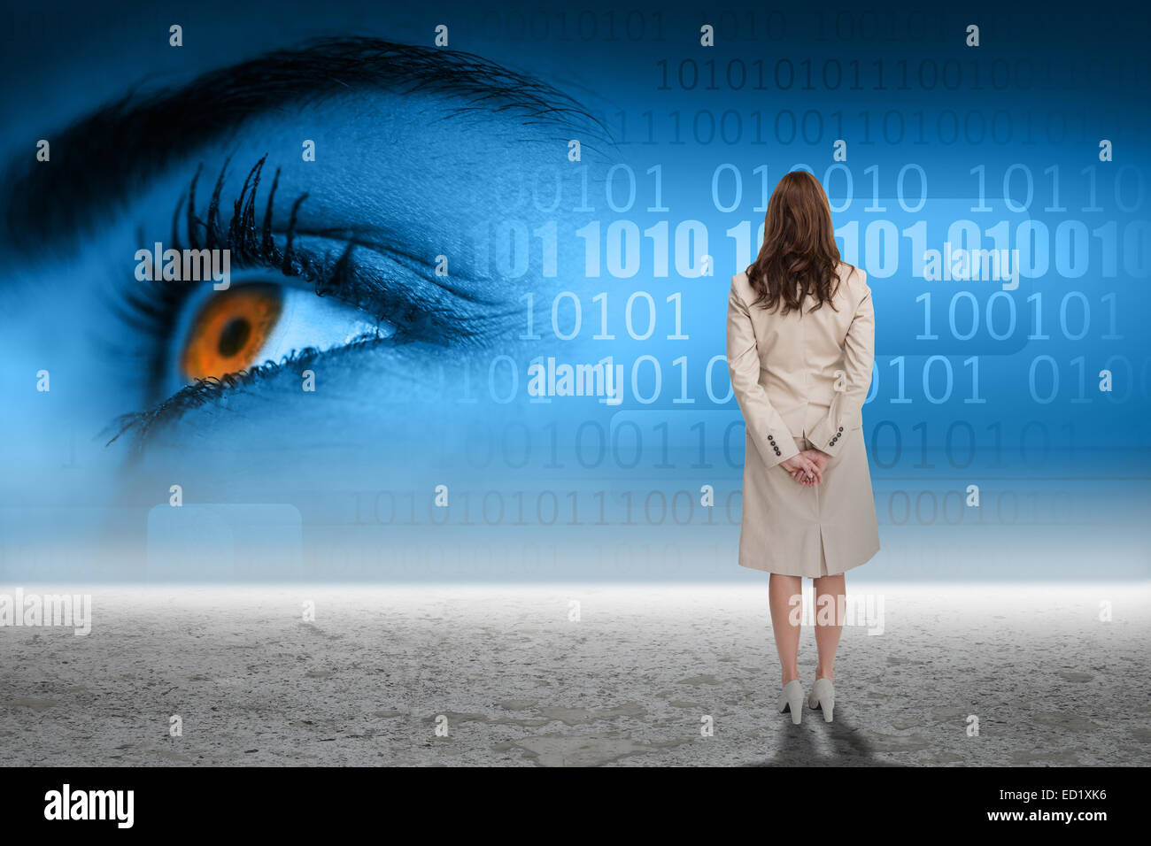 Composite image of rear view of businesswoman Stock Photo - Alamy