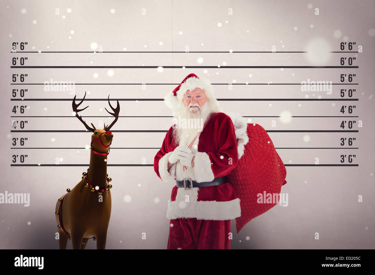 Composite image of santa carries his red bag Stock Photo - Alamy