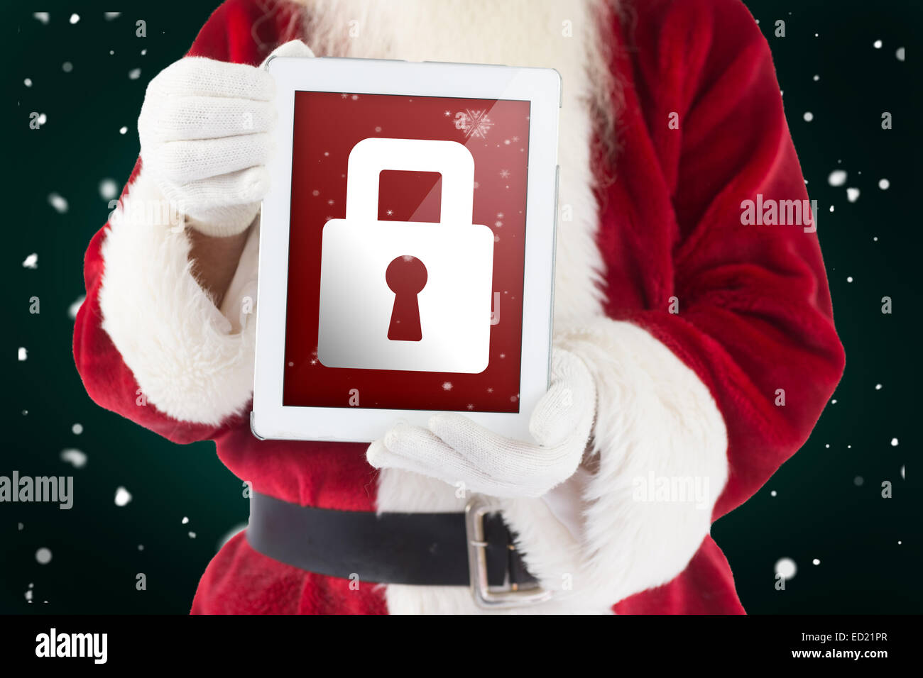 Composite image of santa claus showing tablet pc Stock Photo - Alamy