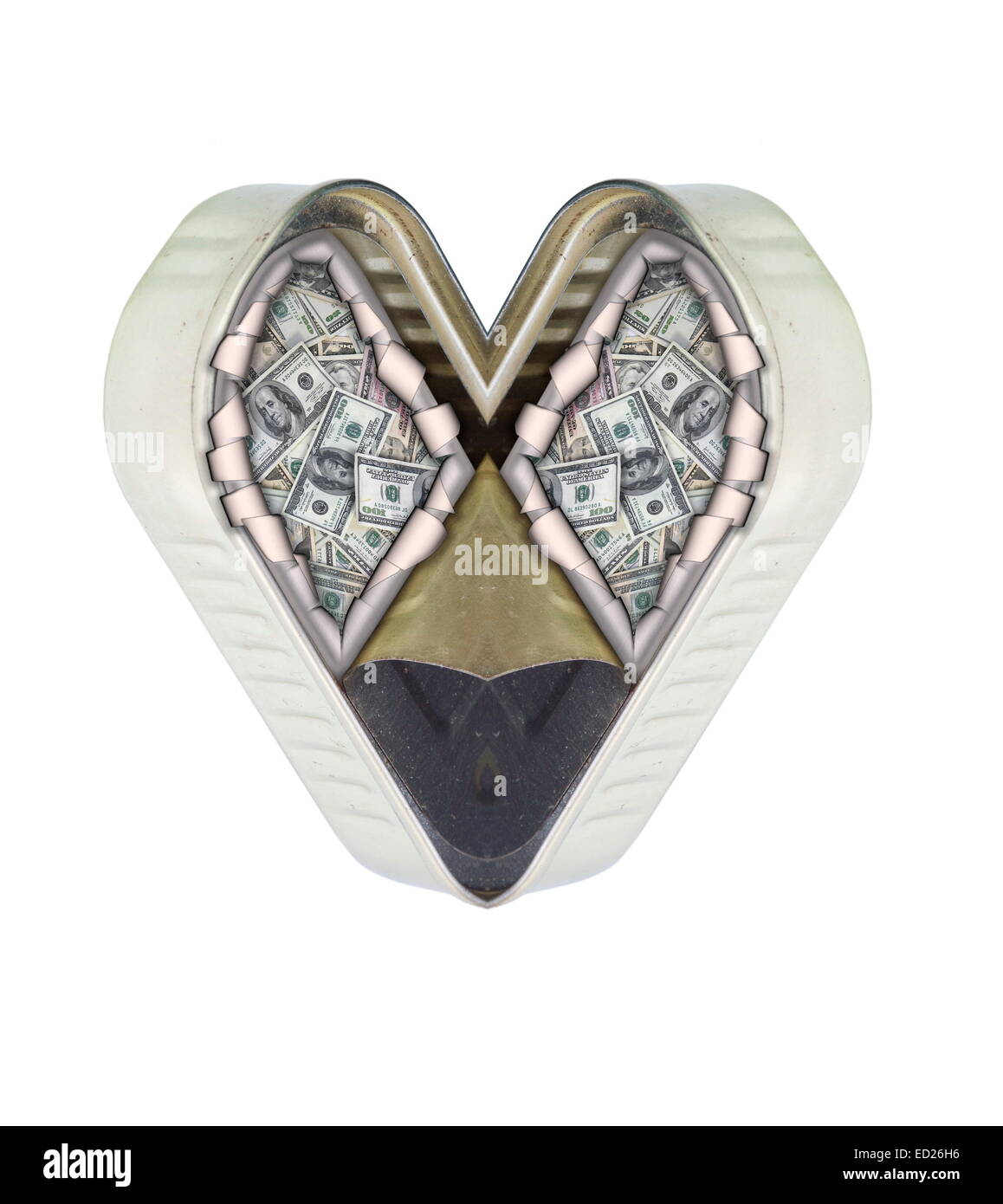 money in the tin looks like heart Stock Photo