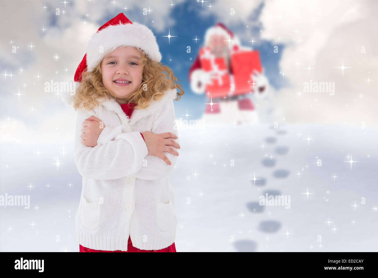 Composite image of festive little girl smiling at camera Stock Photo ...