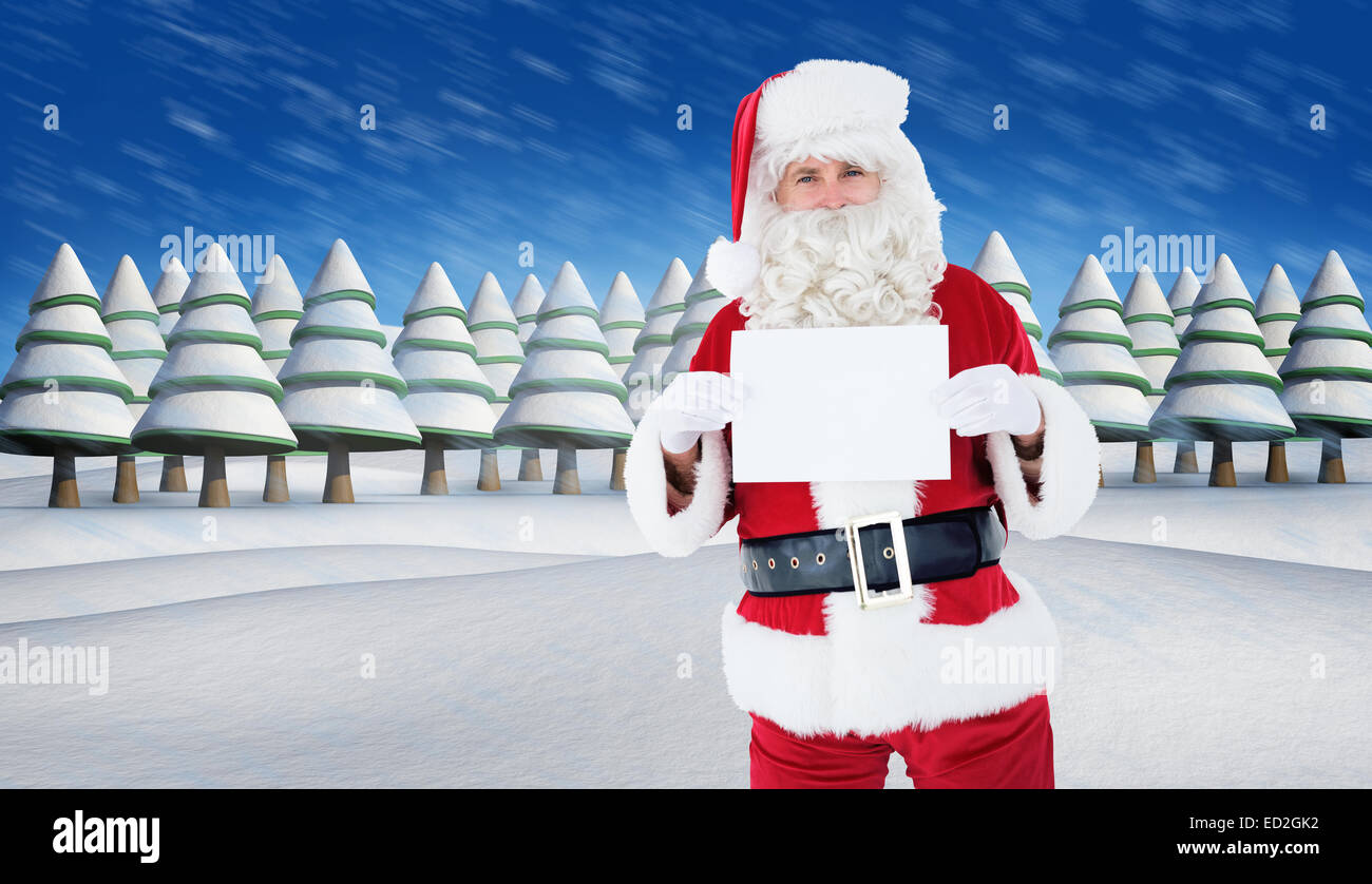 Composite image of smiling santa claus holding page Stock Photo - Alamy