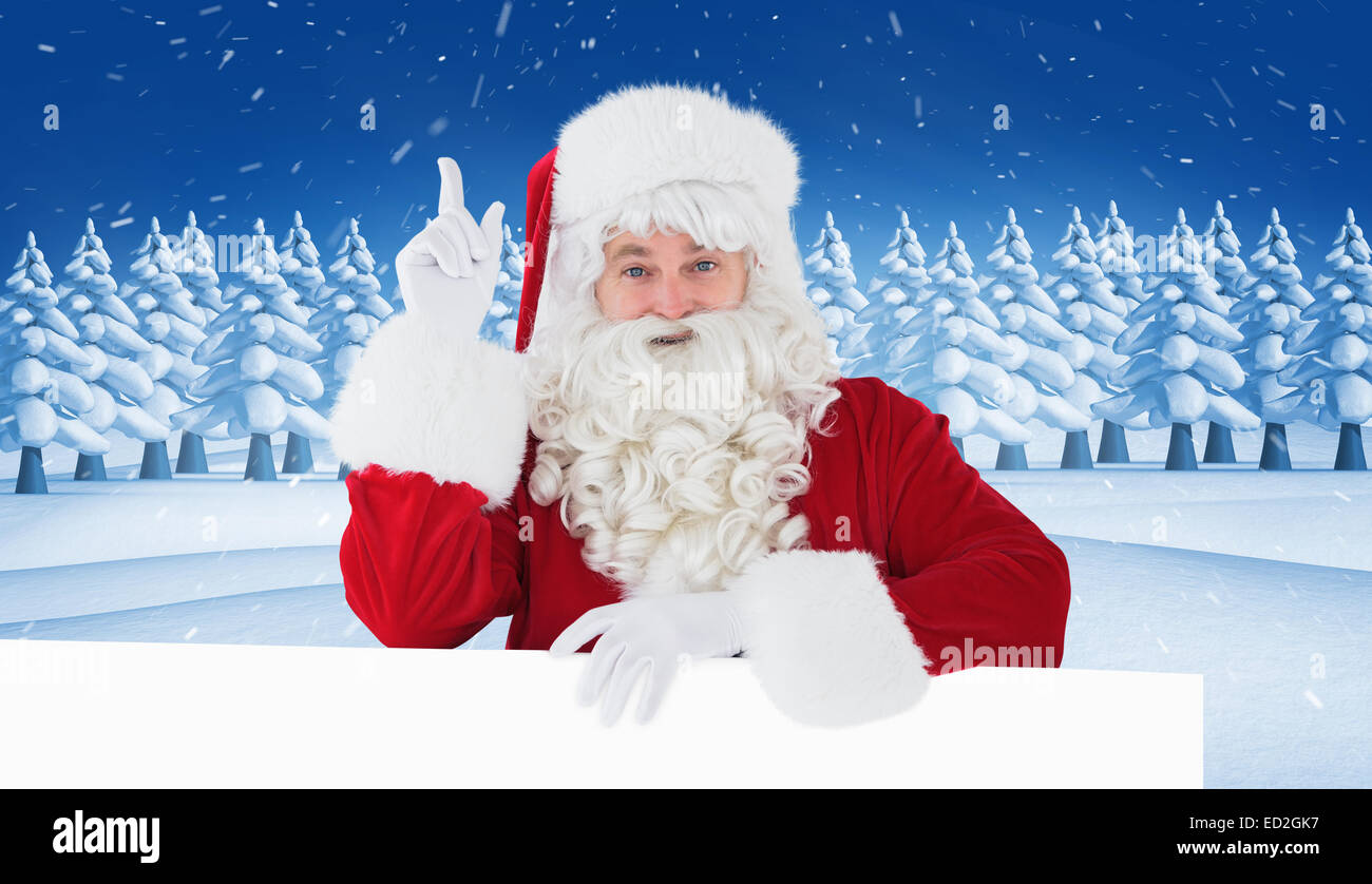 Composite image of smiling santa claus doing a gesture Stock Photo - Alamy