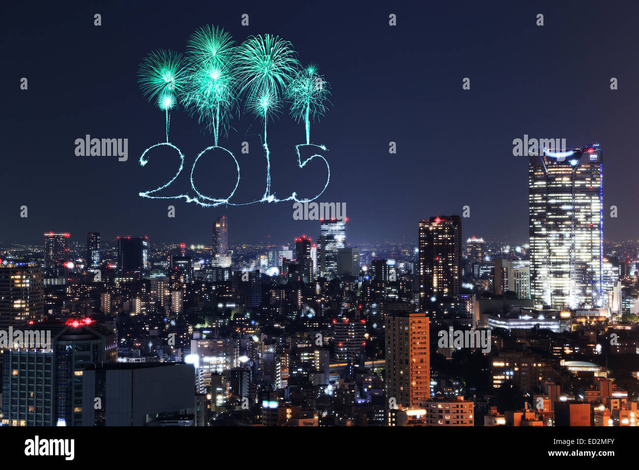 2015 New Year Fireworks celebrating over Tokyo cityscape at night, Japan Stock Photo