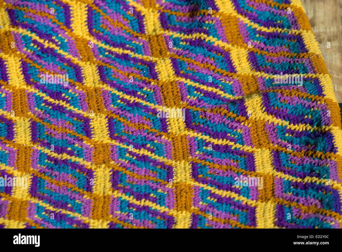 Melanesia, Papua New Guinea, Tufi. Detail of colorful woven PNG textile. Stock Photo