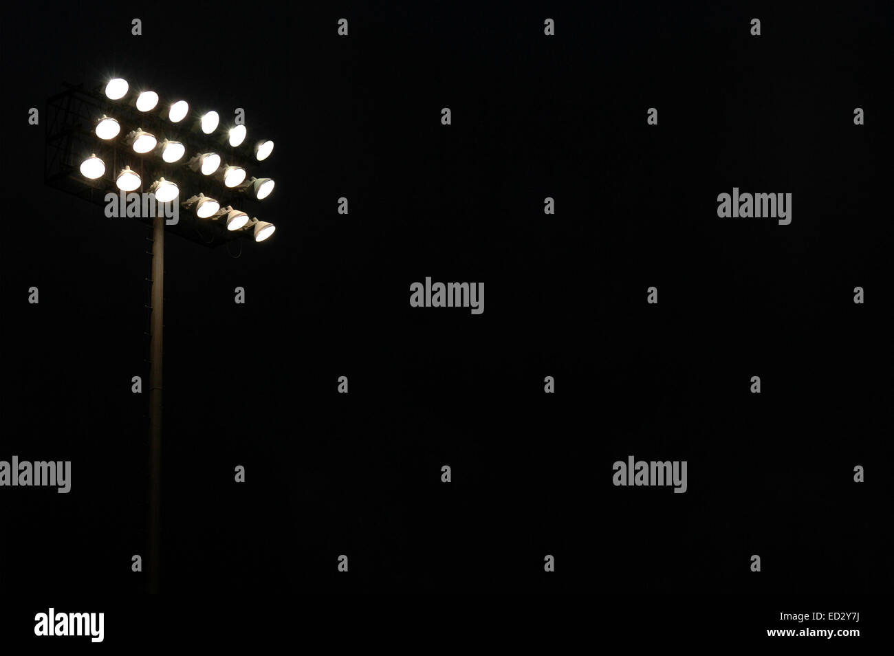 Stadium lights on a sports field Stock Photo
