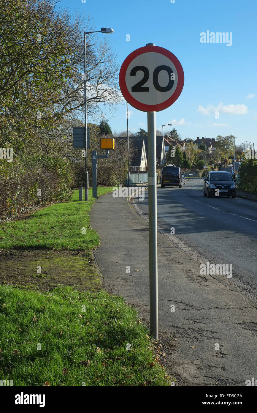 20 mph speed limit sign with speed camera Stock Photo