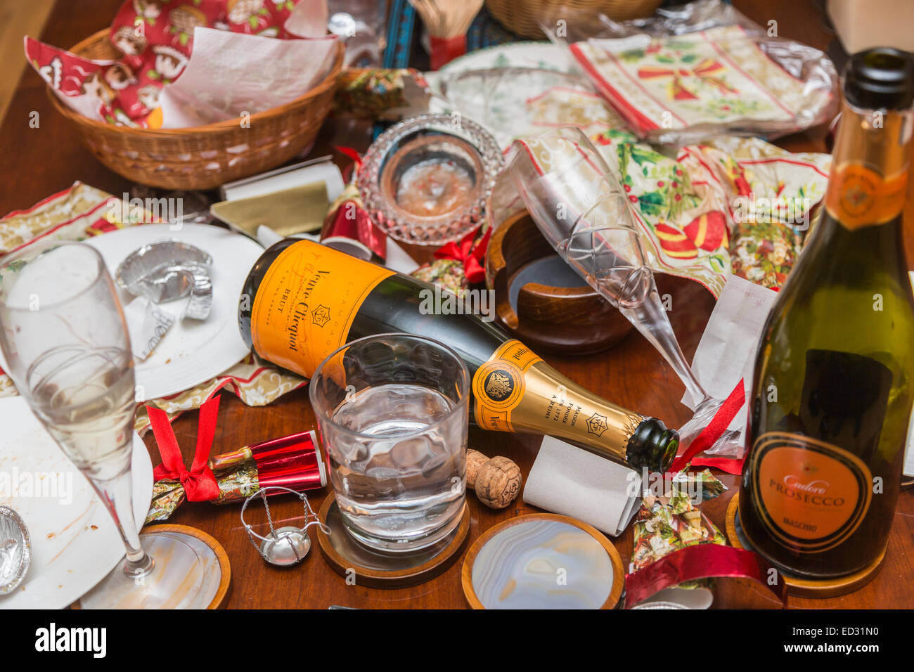 Debris in the aftermath of a festive season party with an empty Veuve