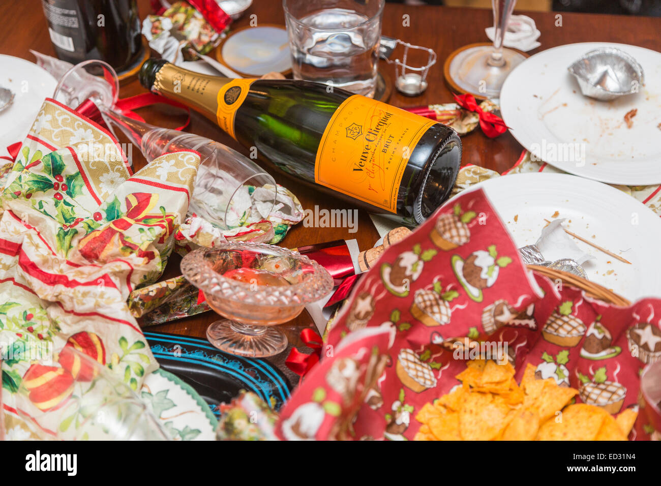 Debris in the aftermath of a festive season party with an empty Veuve