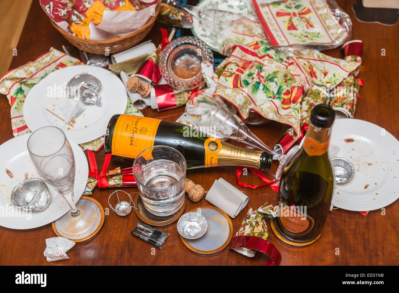 Debris in the aftermath of a festive season party with an empty Veuve
