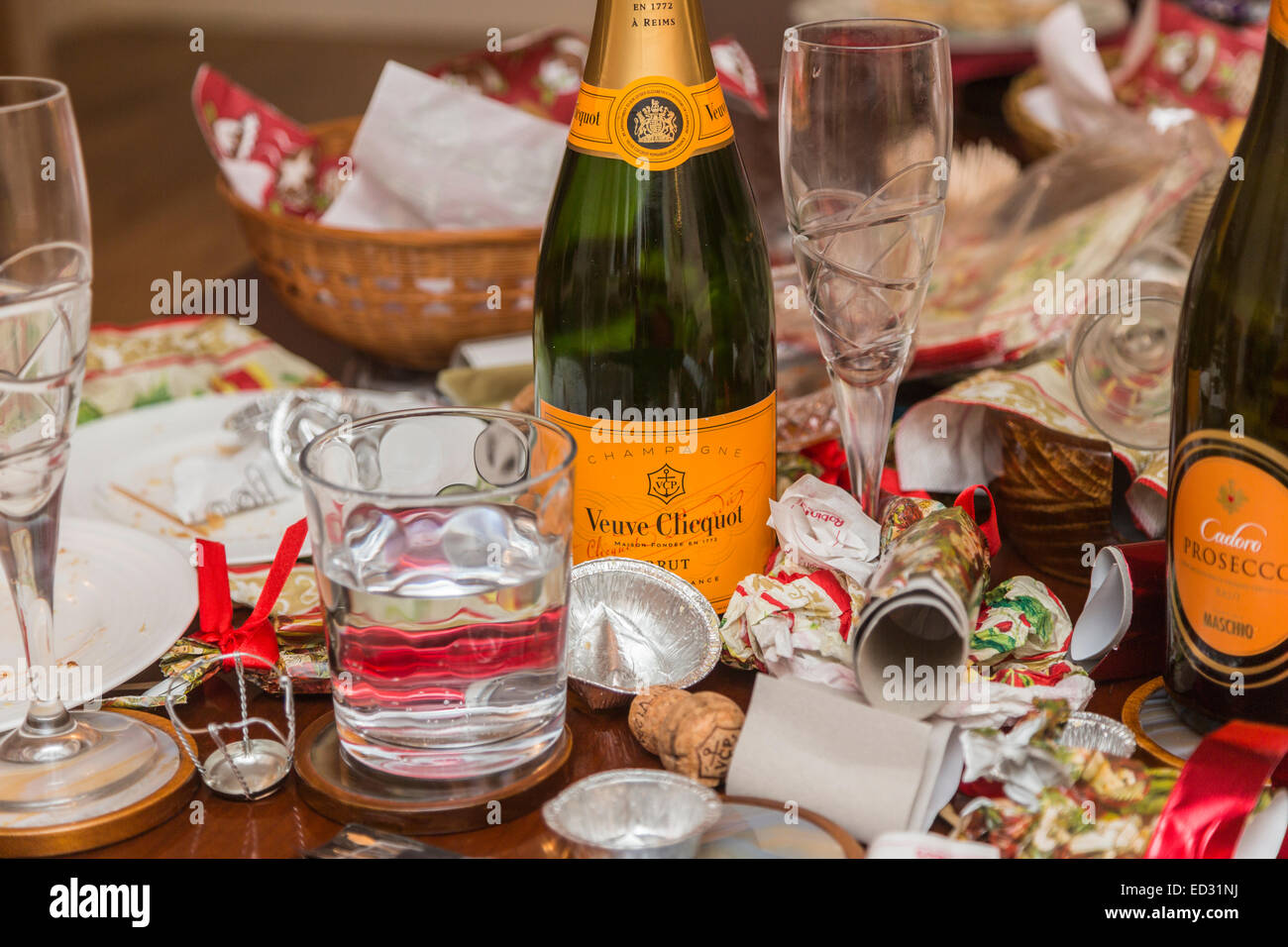 Debris in the aftermath of a festive season party with an empty Veuve