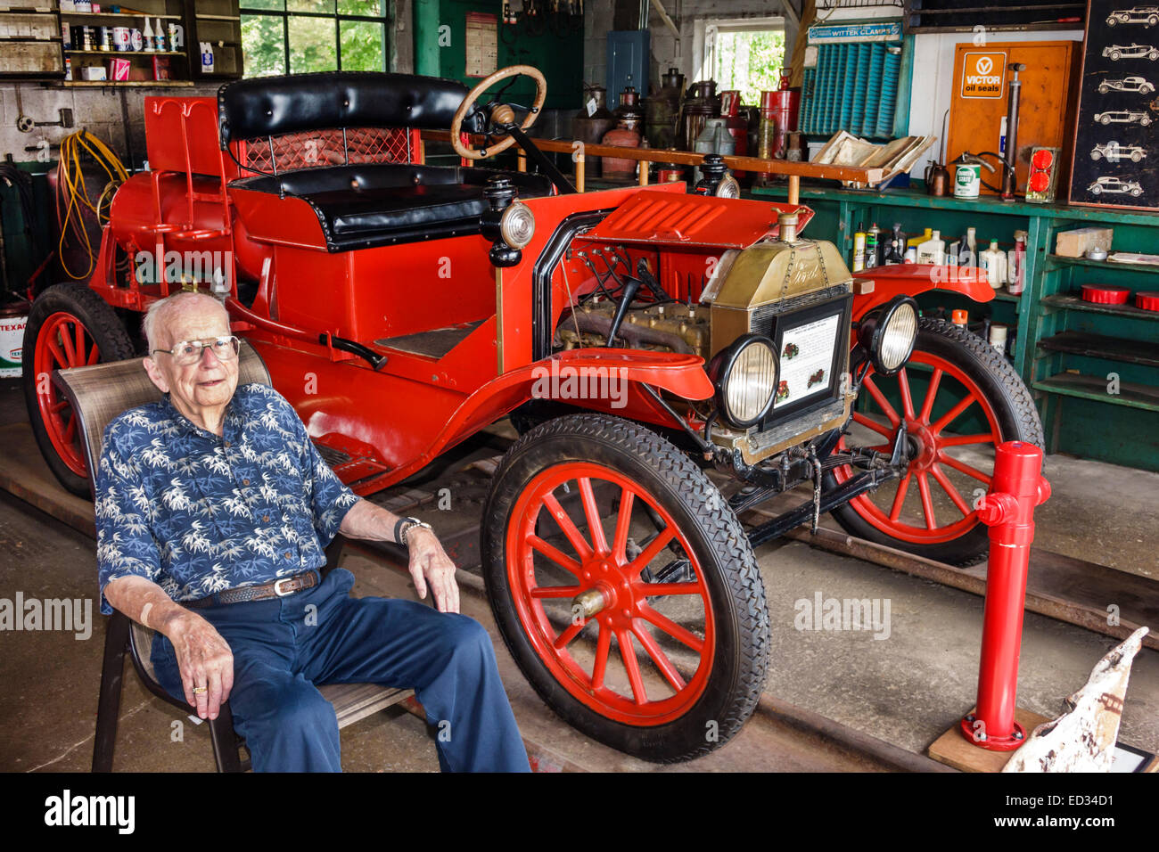 Illinois Dwight,historic highway Route 66,Ambler-Becker Texaco Station 1933,gas,petrol,pump,roadside,senior seniors citizen citizens,man men male,anti Stock Photo